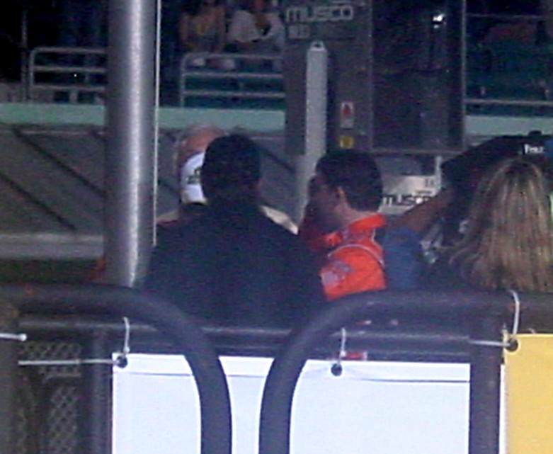 Tony Stewart interviewed at bottom of flag pole